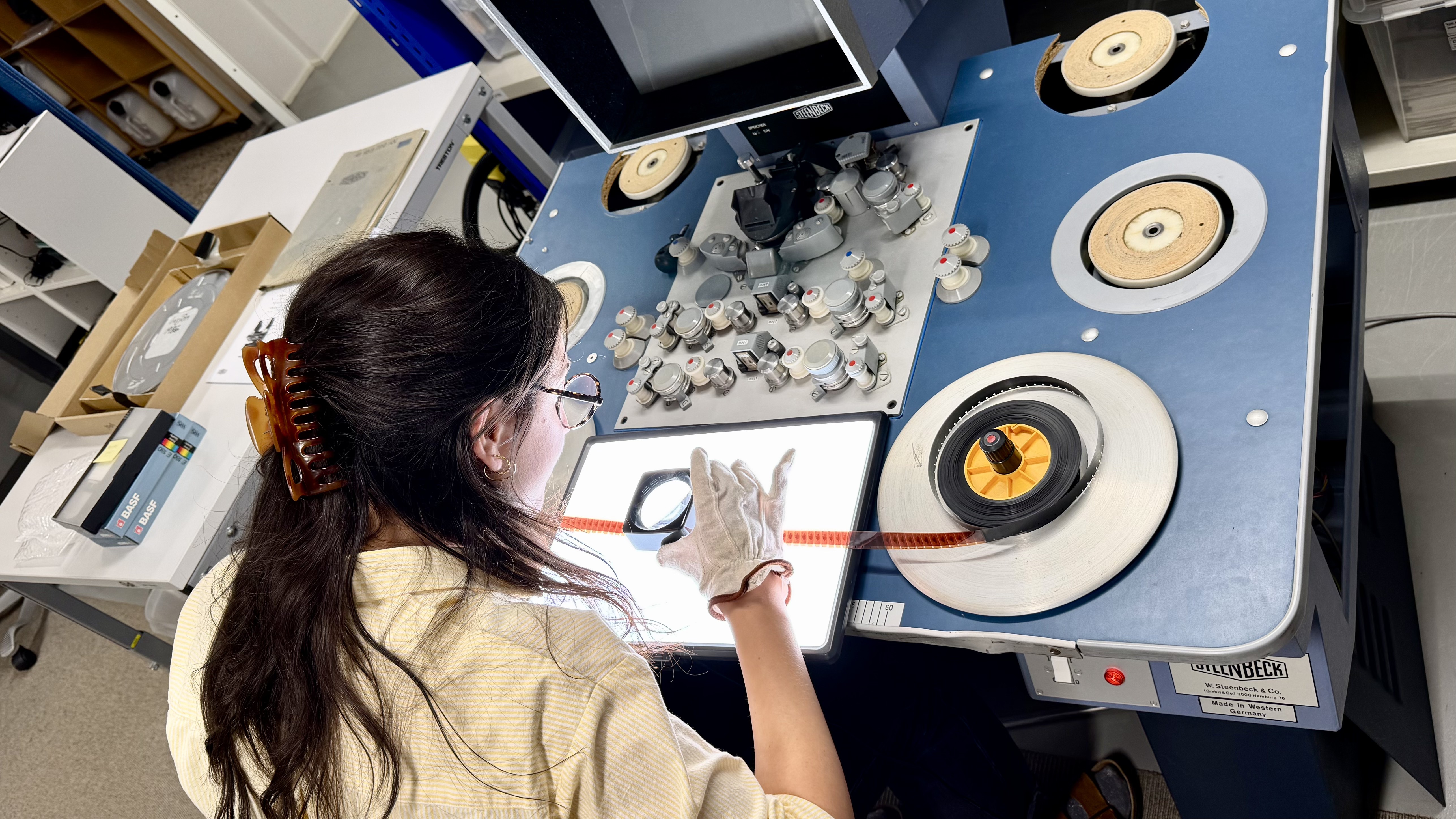 Ocean Archive archivist Jeanne-Alice cataloguing materials from the Tony Holm donation.