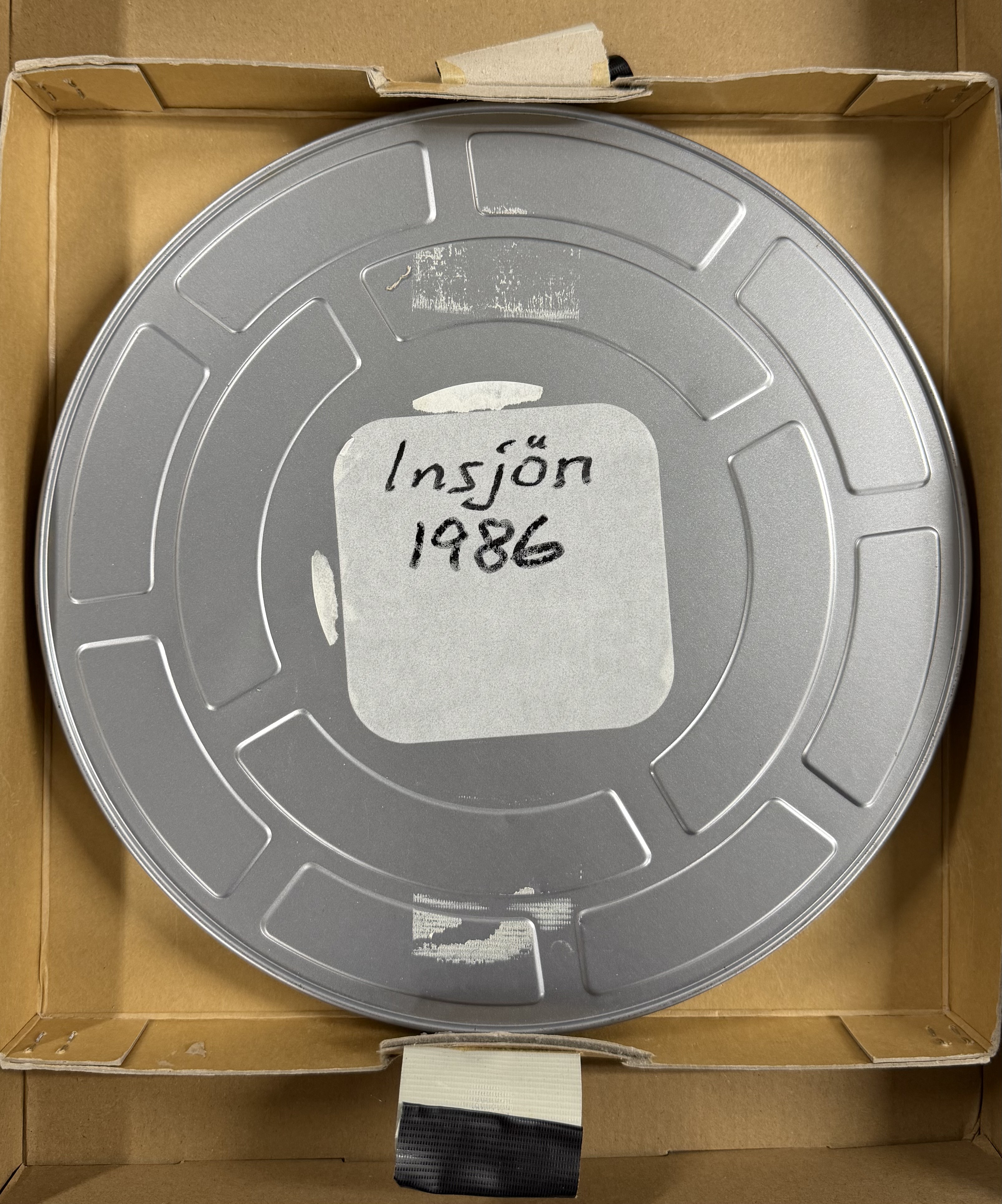 A film reel from Tony Holm's production 'Insjön', dated 1986 — one of many items now entering the archive.