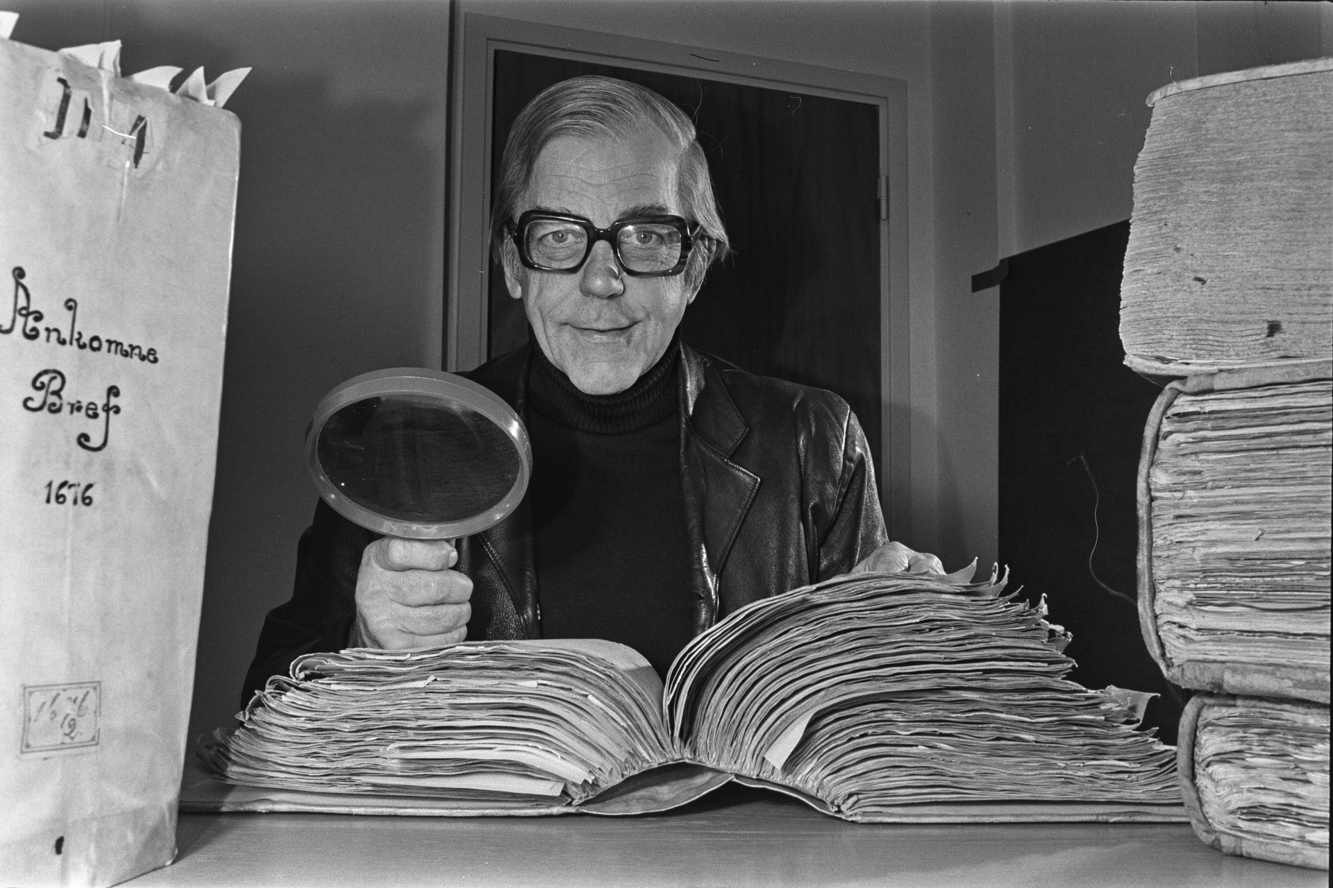Anders Franzén — the Swedish researcher who located the wreck of the royal warship Vasa — studying original 17th-century archive material.