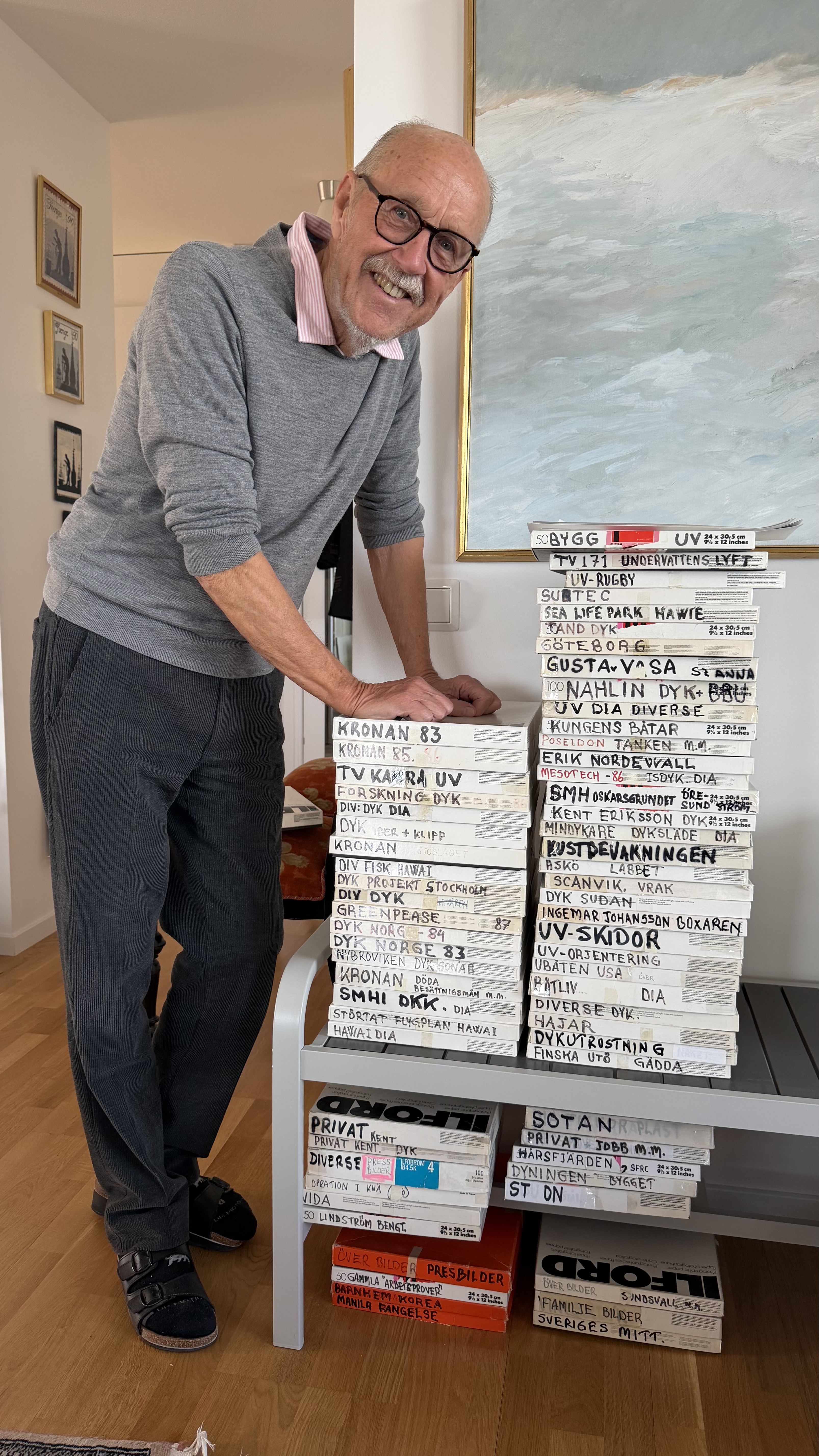 Hand-labelled boxes documenting decades of underwater work — Kronan, Kustbevakningen, Nahlin, UV-rugby, Askö and many more.